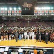 Picture of Academic Distinction Students on the Court for "Storm the Court"