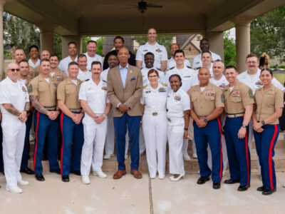U.S. Navy and U.S. Marine Corps personnel join Texas Southern University leadership and partners for a group photo during a Naval Leadership Reception hosted by the University in celebration of Fleet Week Houston 2026.