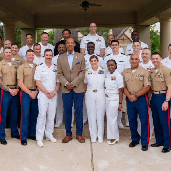 U.S. Navy and U.S. Marine Corps personnel join Texas Southern University leadership and partners for a group photo during a Naval Leadership Reception hosted by the University in celebration of Fleet Week Houston 2026.