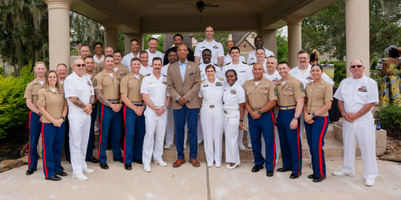 U.S. Navy and U.S. Marine Corps personnel join Texas Southern University leadership and partners for a group photo during a Naval Leadership Reception hosted by the University in celebration of Fleet Week Houston 2026.